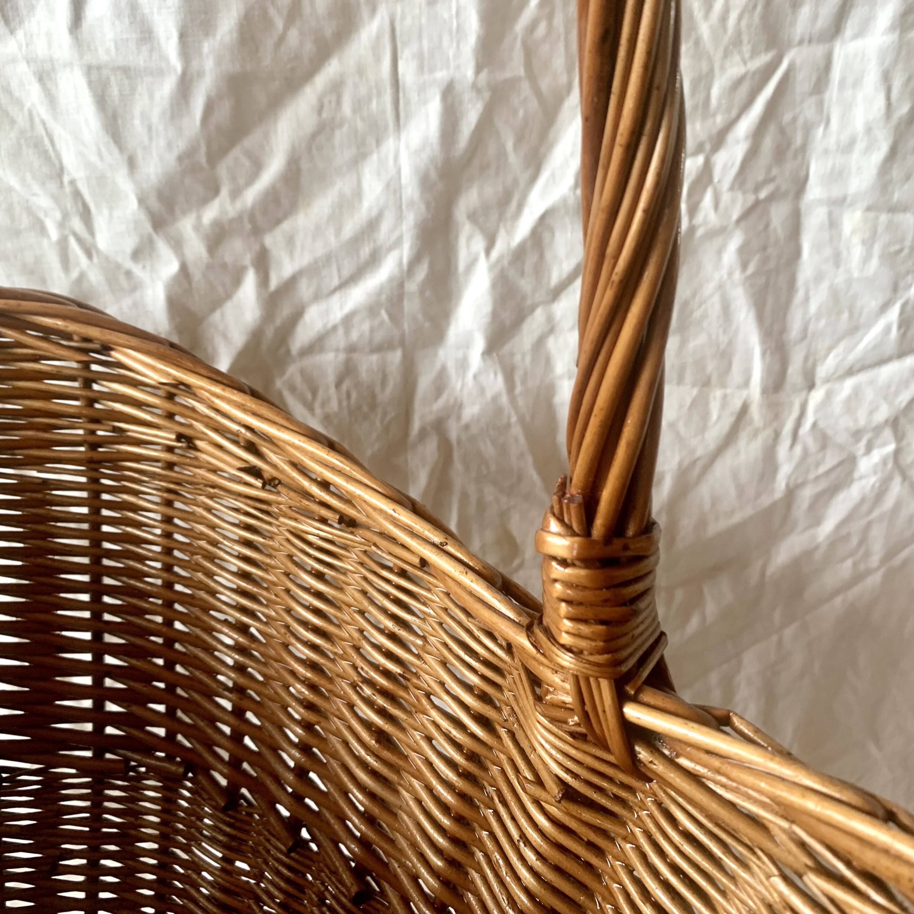 Old woven wicker umbrella stand