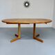 Antique round Scandinavian dining table from the 70s with 1 solid wood extension