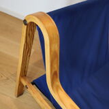 Scandinavian curved wooden armchairs