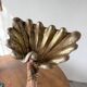 Immense wooden plate 1900 shell with golden patina