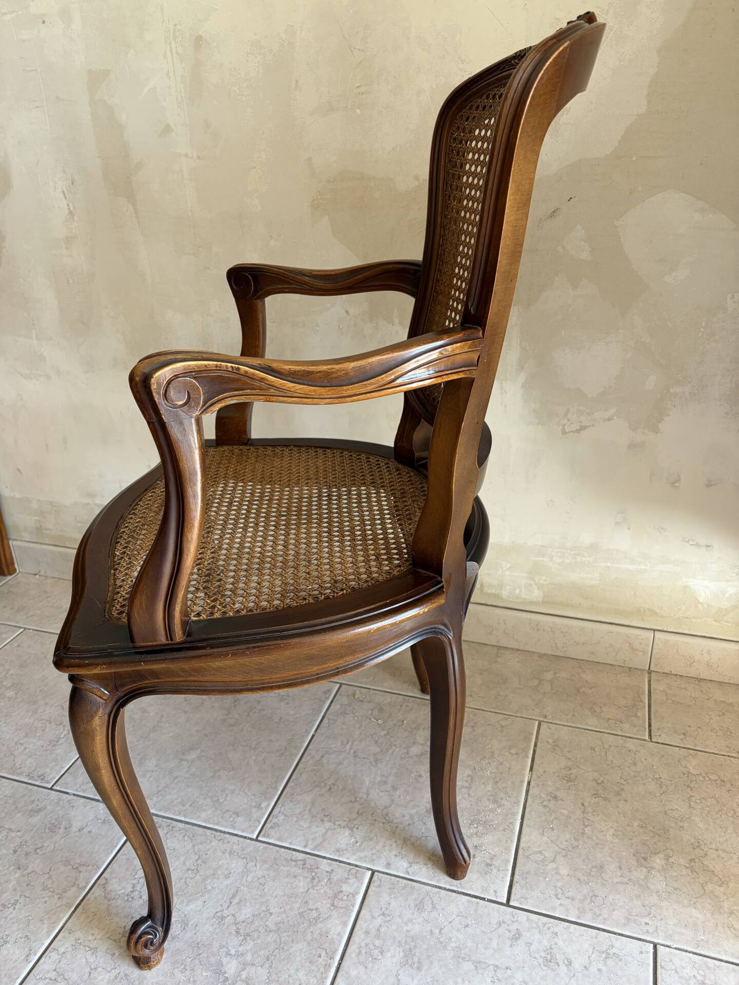Wood and cane armchair