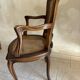 Wood and cane armchair