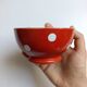 Red bowl with white polka dots in Longchamp ceramic