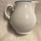 Small monogrammed milk jar