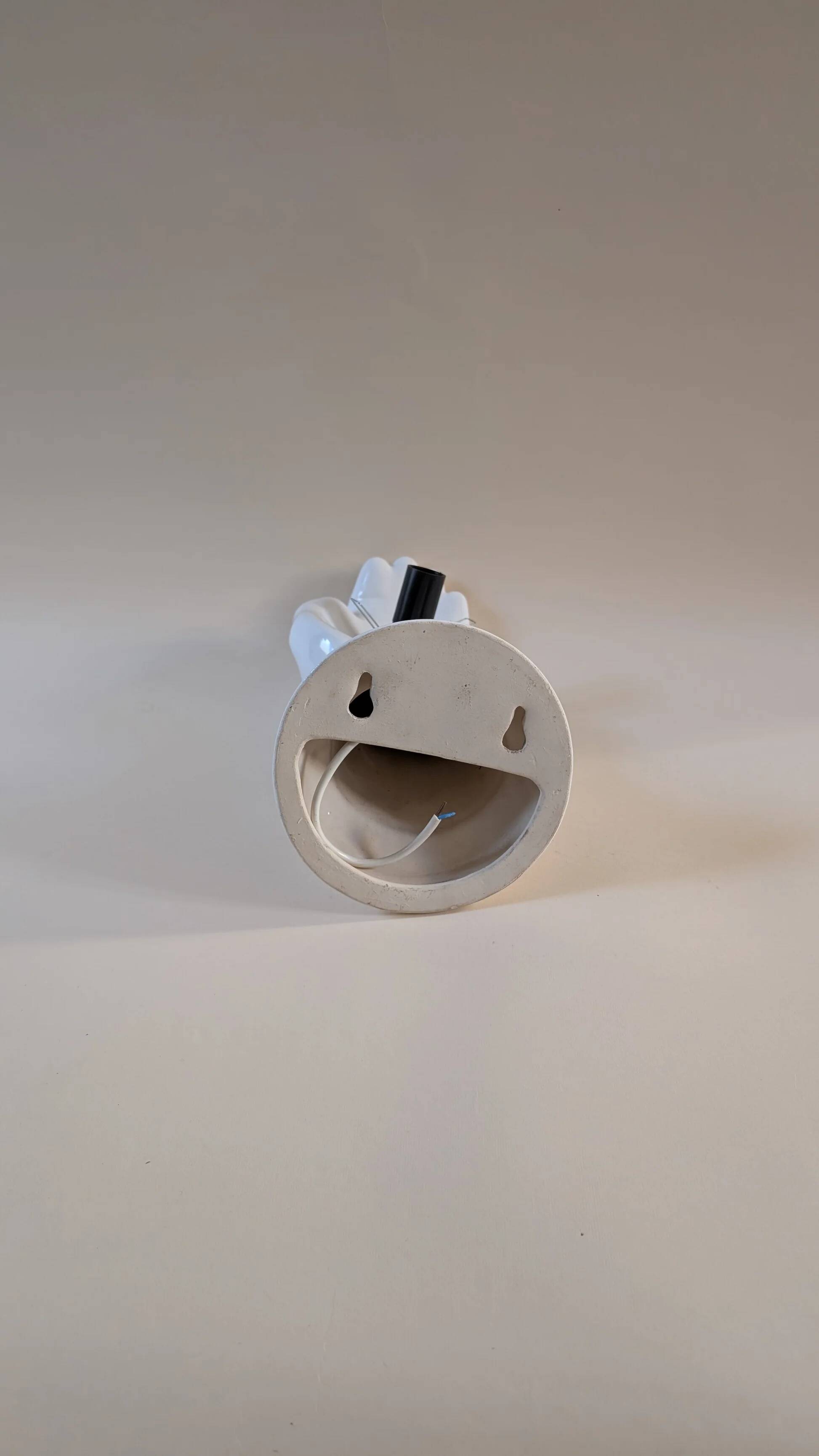 Ceramic hand wall lamp, 1980