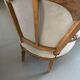 Pair of cabriolet armchairs in light grey and dark grey Louis XV style.