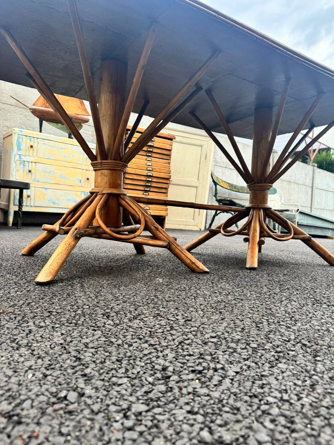 Vintage 1950s set: large table with tripod base and benches in woven chestnut