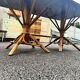 Vintage 1950s set: large table with tripod base and benches in woven chestnut