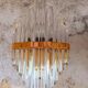 Pair of wall sconces in crystal glass and gilded brass. Venini style.