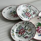 5 plates with colorful Sarreguemines floral designs.