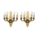 Pair of L'Originale wall sconces plated with 24-carat gold featuring four bronze candles.