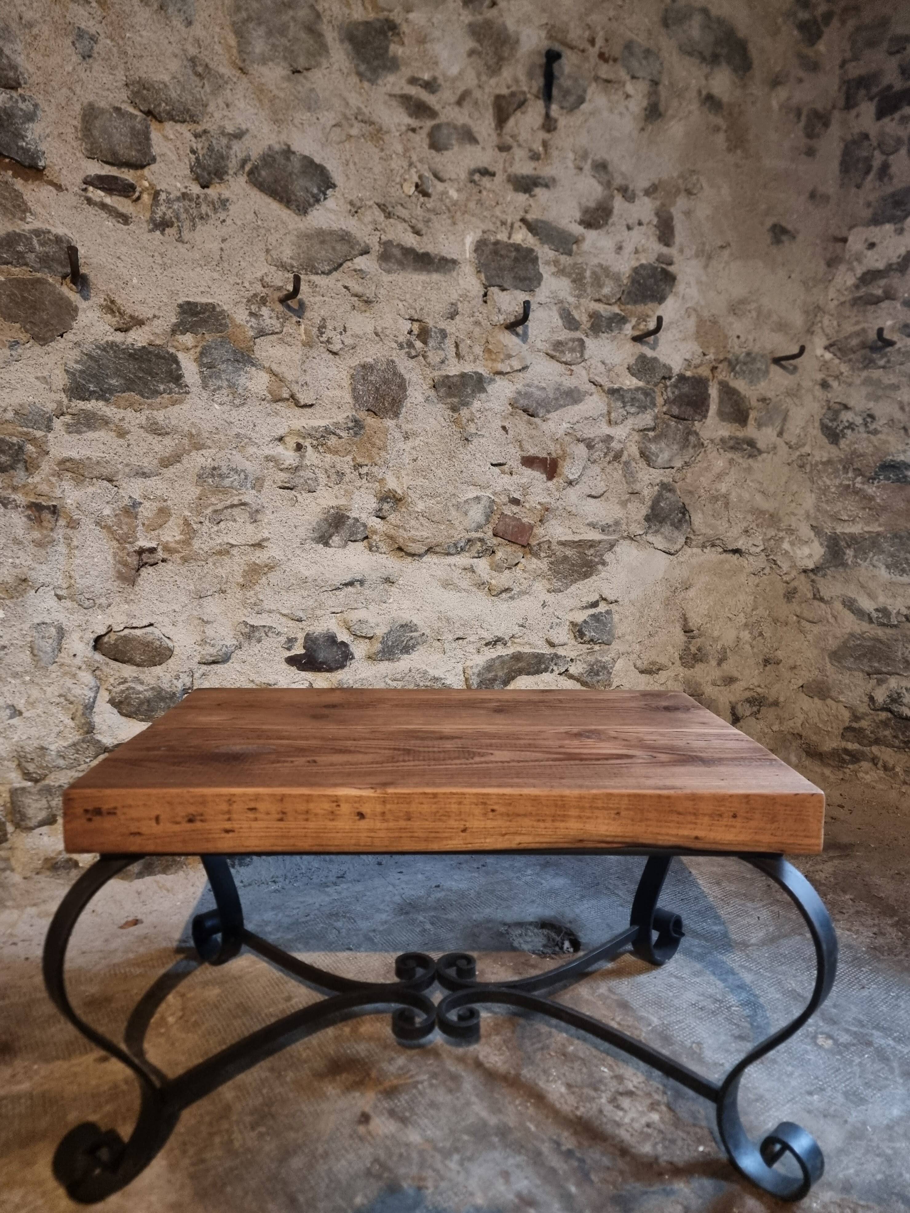 Vintage French coffee table from the 1960s – Rustic pine coffee table with a black iron base.