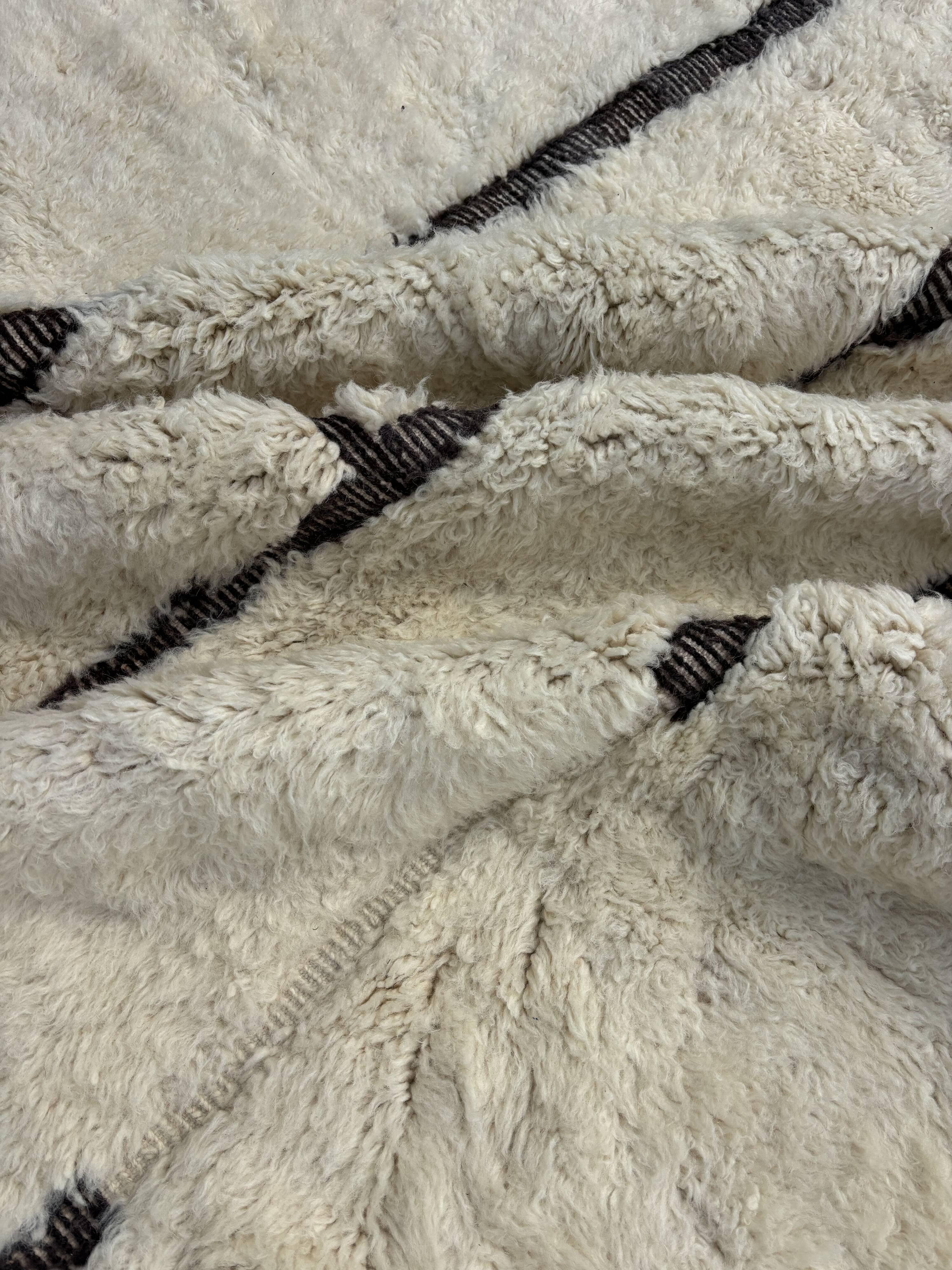 Large Berber M'rirt rug in cream and black wool, Moroccan rug.