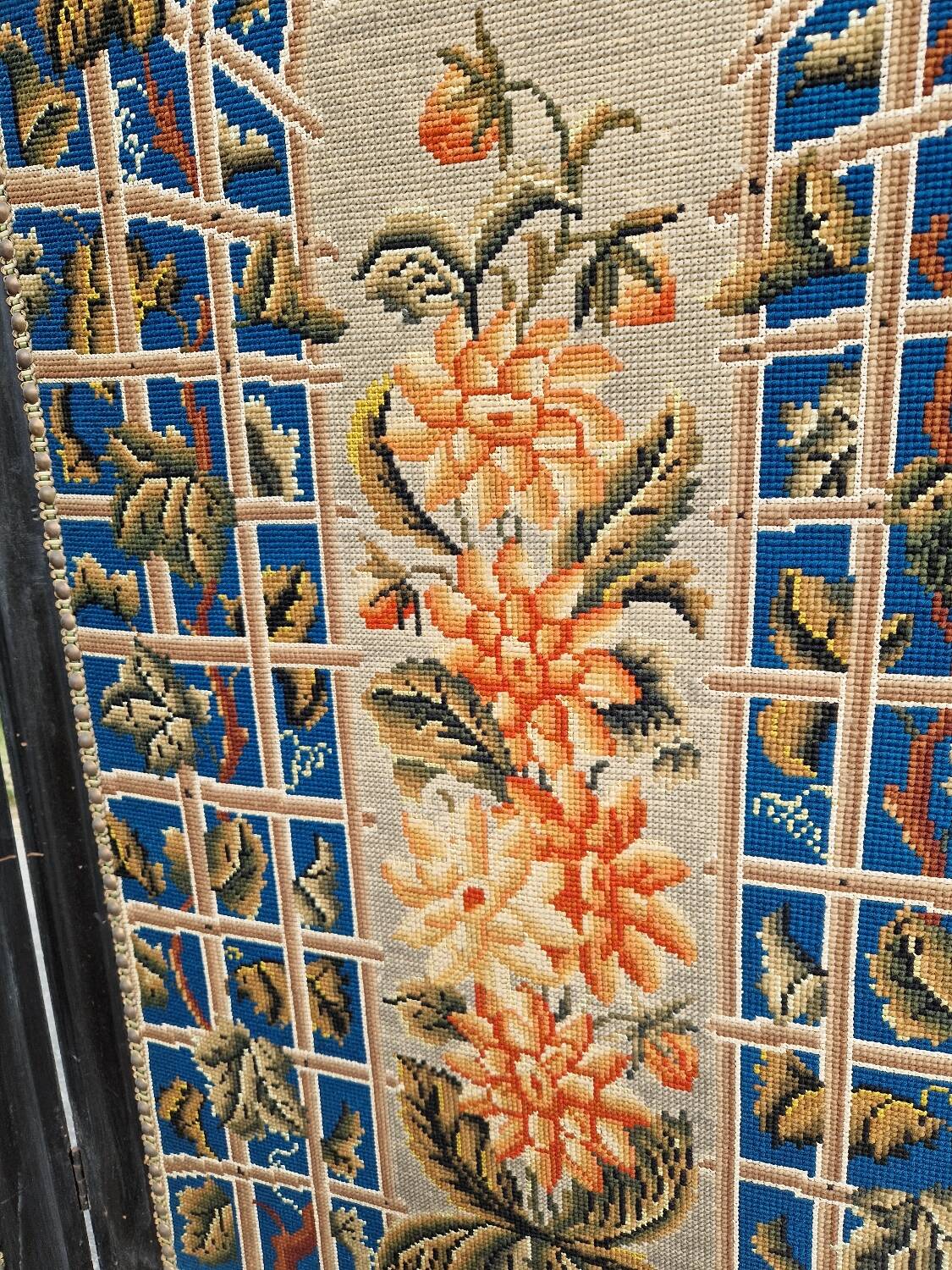 Folding screen in black-painted wood, 19th century