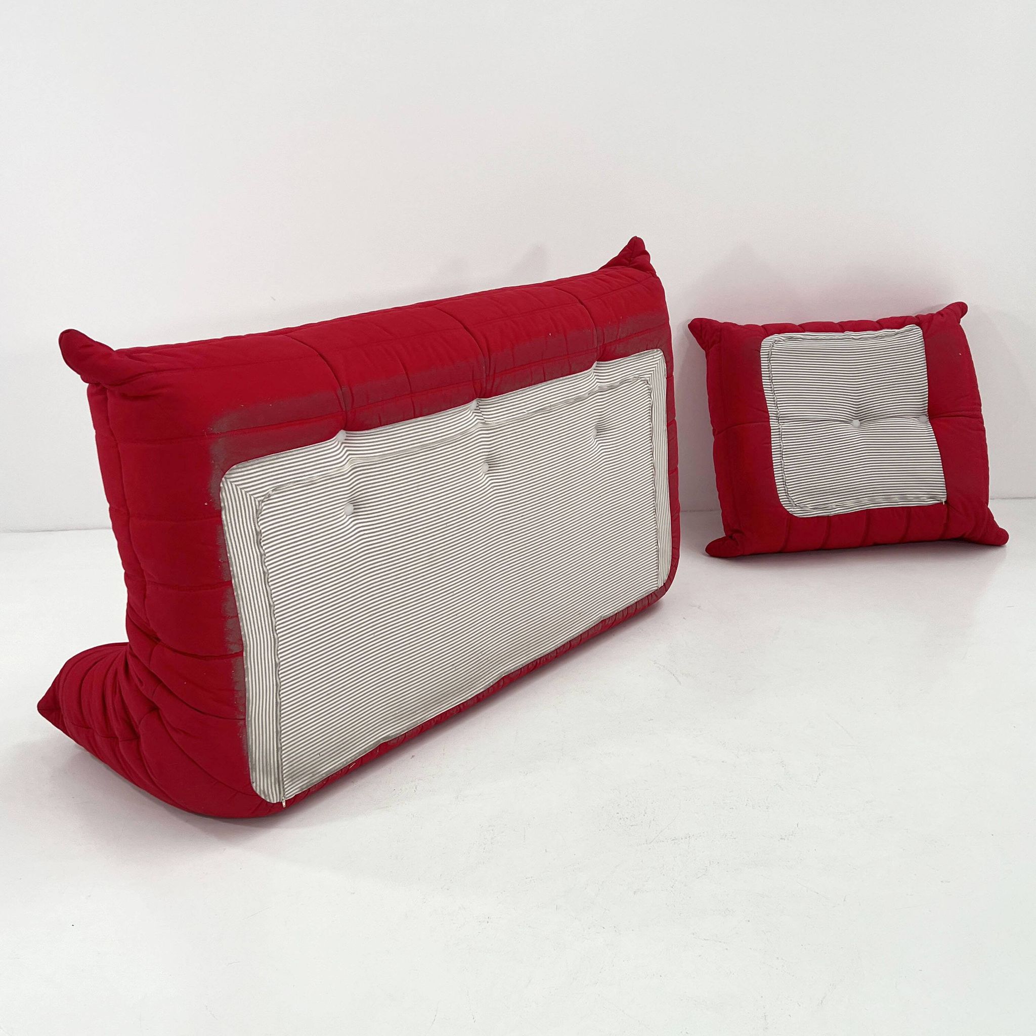 Togo 3-seater with red ottoman by Michel Ducaroy for Ligne Roset, 1970.
