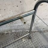 Vintage silver chrome-plated steel and glass two-tier serving trolley with wheels