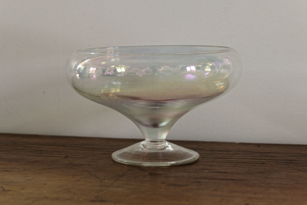 Old iridescent glass cup