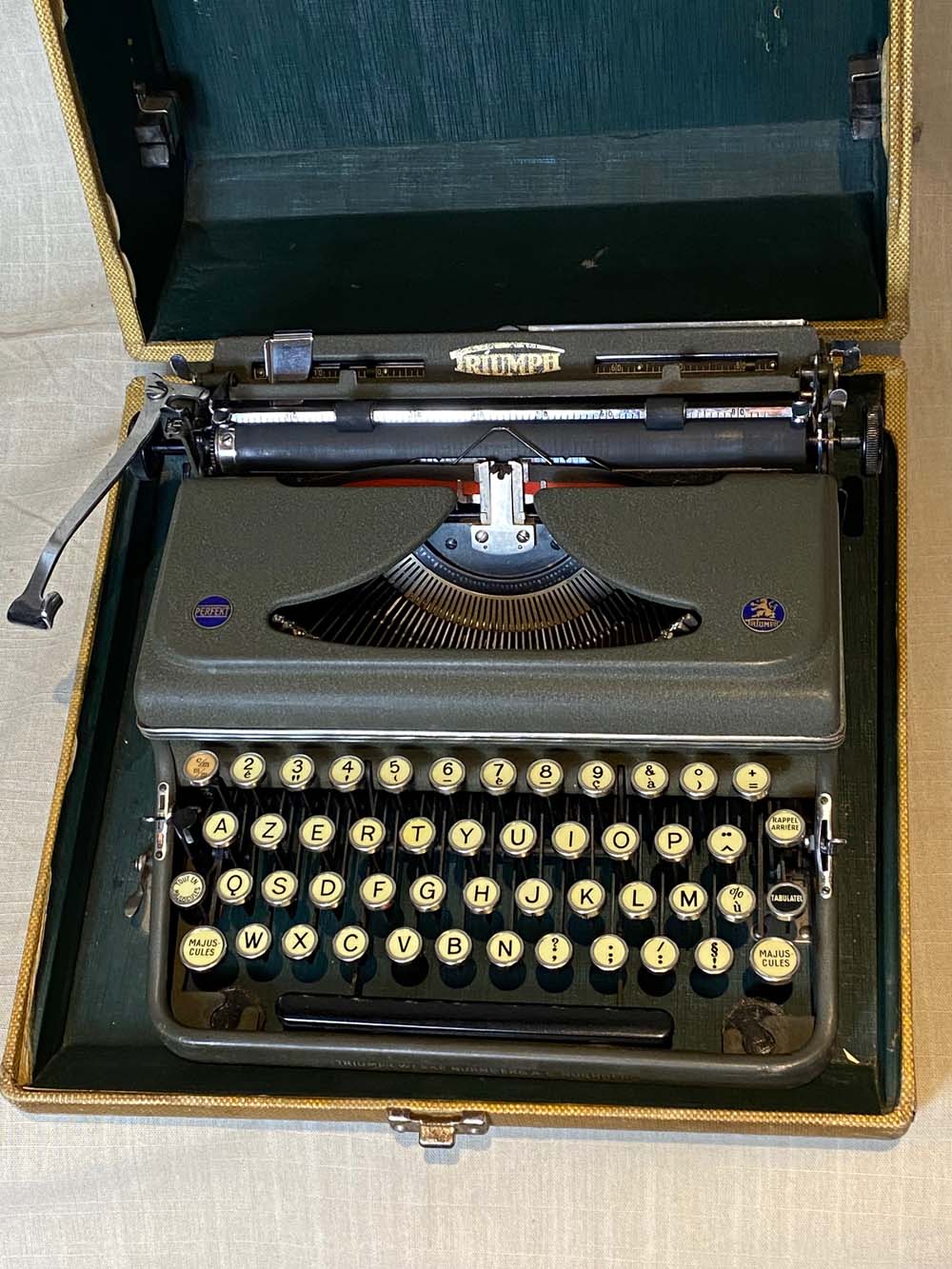 Triumph perfekt typewriter with its transport box.