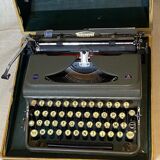 Triumph perfekt typewriter with its transport box.