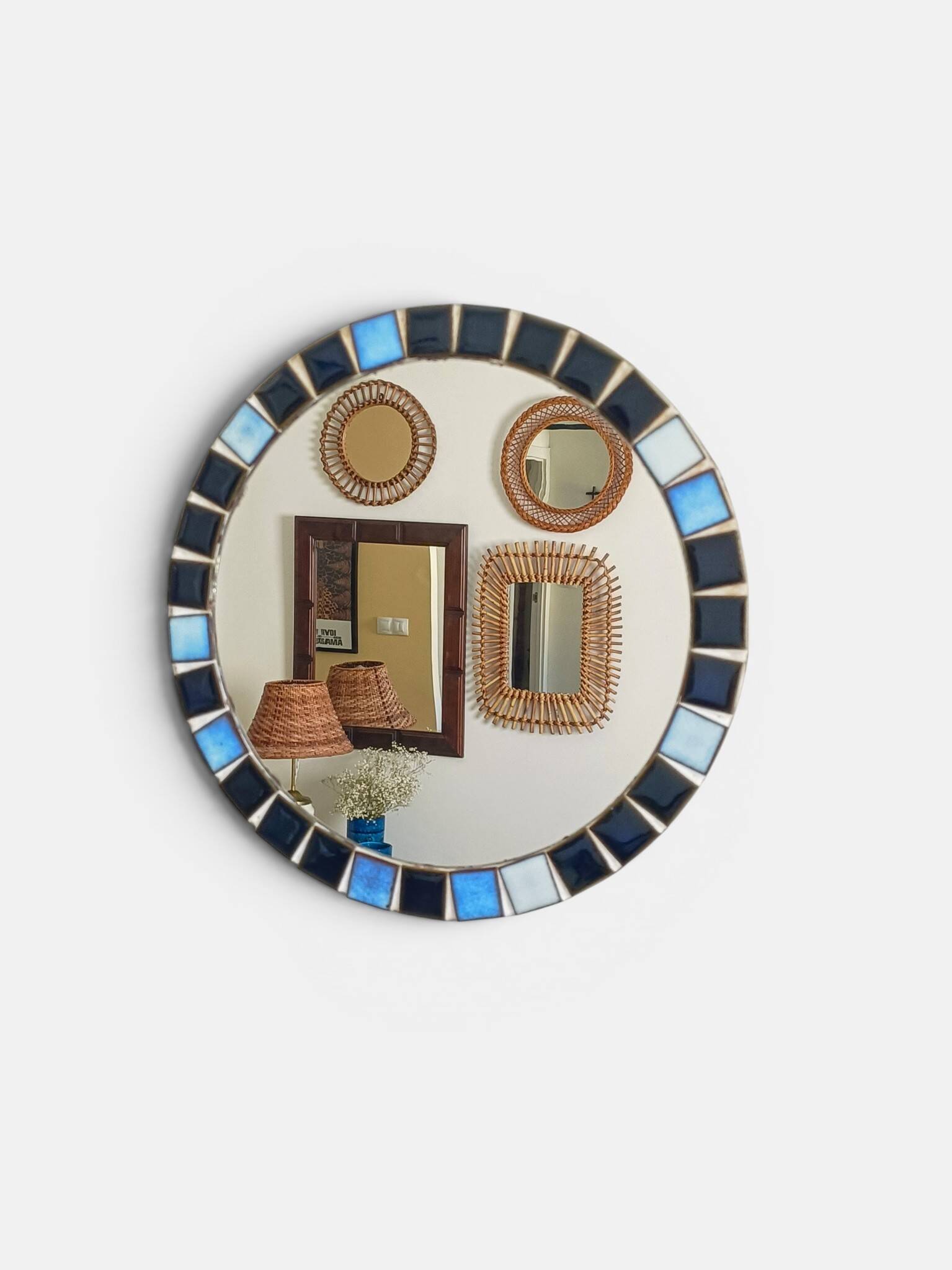 Round mosaic mirror in the style of Vallauris, France circa 1970.