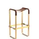 Contemporary kitchen stool, aged brass metal and cognac leather.