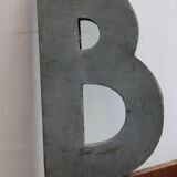 Panel letter in zinc