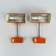 Pair of orange wall sconces from the 1970s by Ateljé Lyktan.