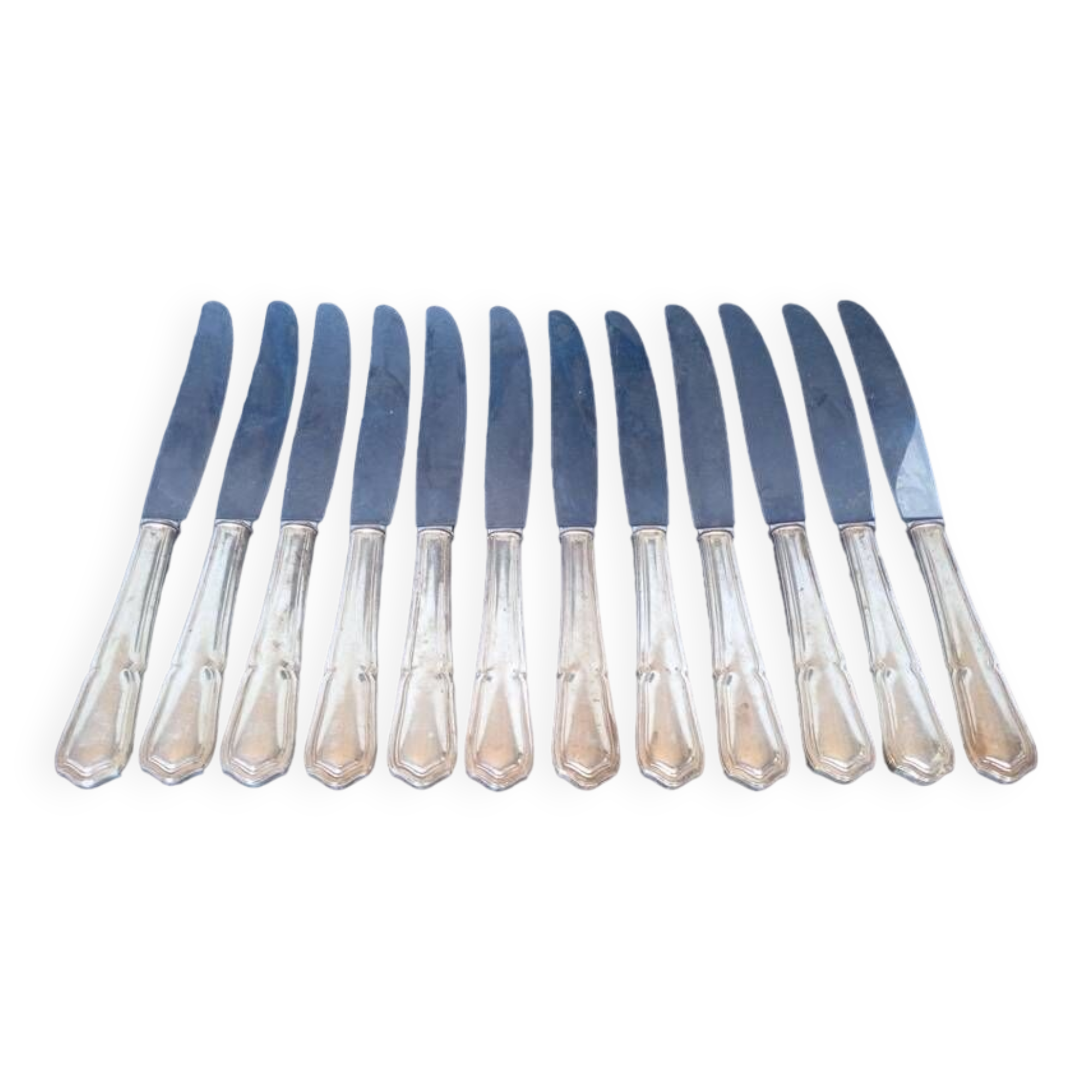 12 knives + silver metal punch from the 1950s