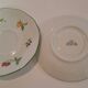 Two cups and saucers in fine porcelain, orchard model.