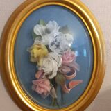 Silk flower frame under curved glass