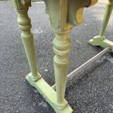 Old table with patinated green legs