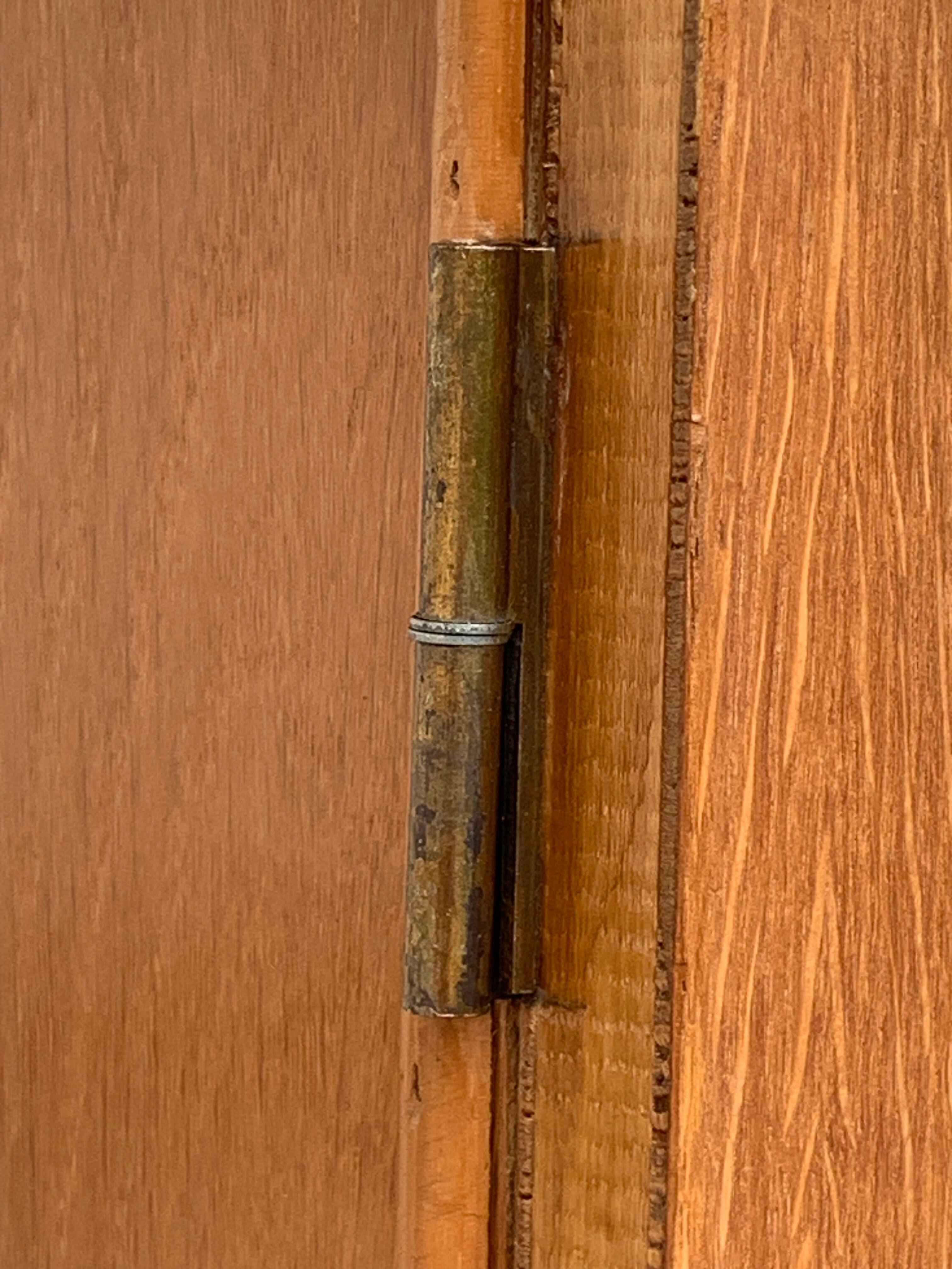 Rattan wardrobe with tapered legs from the 1960s.