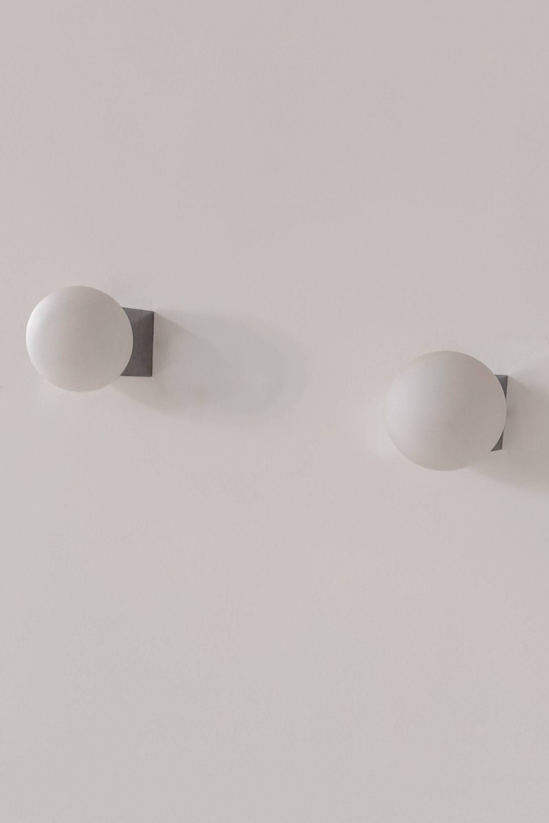 Pair of vintage wall lights in chrome and opaline, France 1990