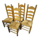 Set of 4 low straw-seated chairs circa 1940