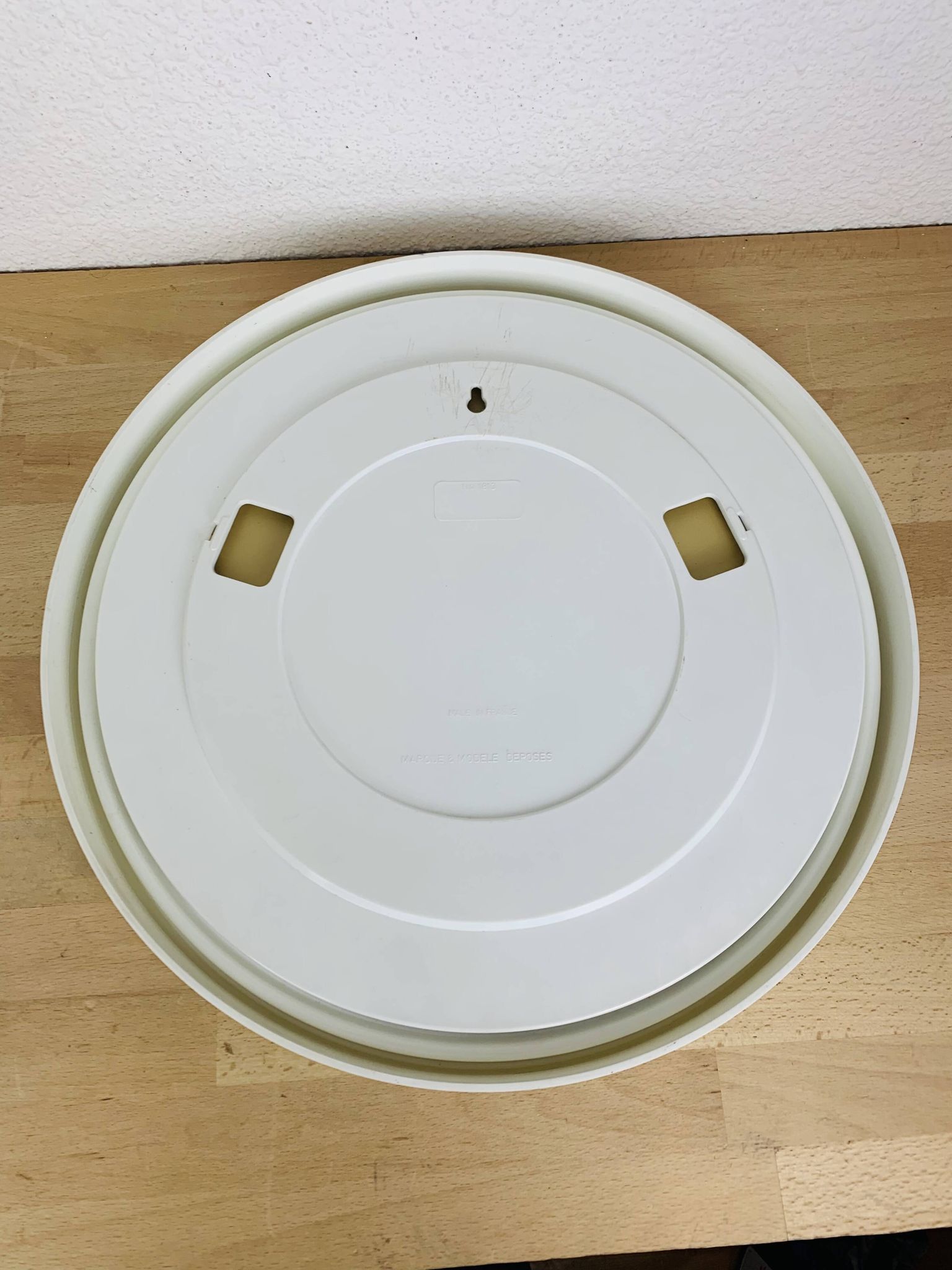 Miroir space age cerclage blanc années 70