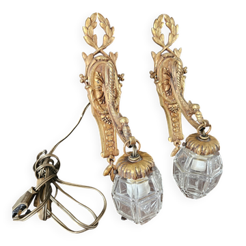 Pair of gilt bronze wall lights in Louis XVI/Empire style.