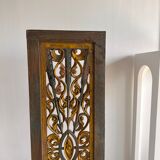 Rectangular Indonesian construction element with blue and yellow plant in carved wood