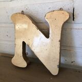 Golden sign letter "N"