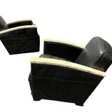 Pair of leather armchairs with marquetry armrests