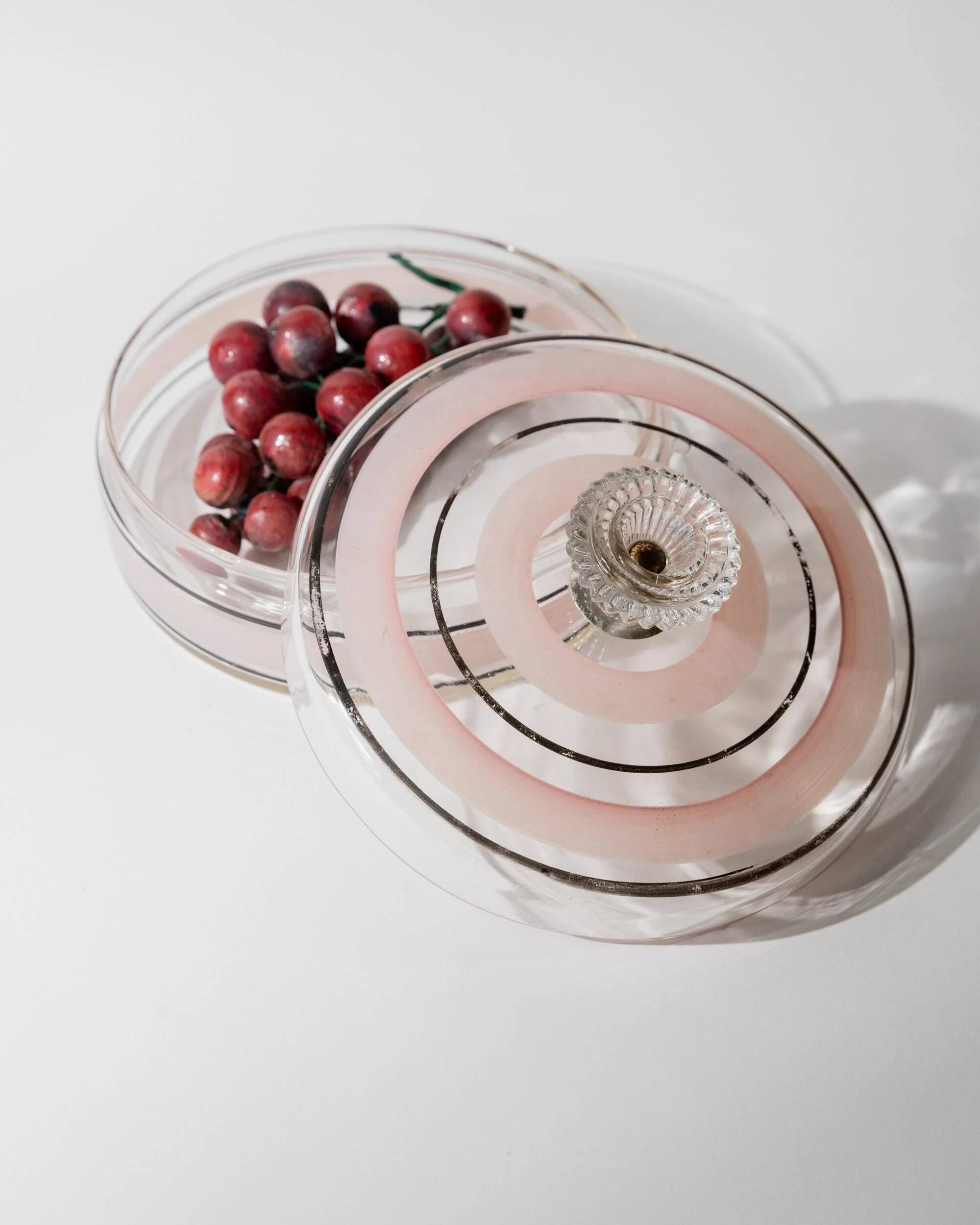 Vintage glass sweet jar from the 1960s, candy jar with a pink and black striped lid, Italian glass art.