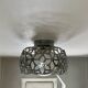 Metal design suspension