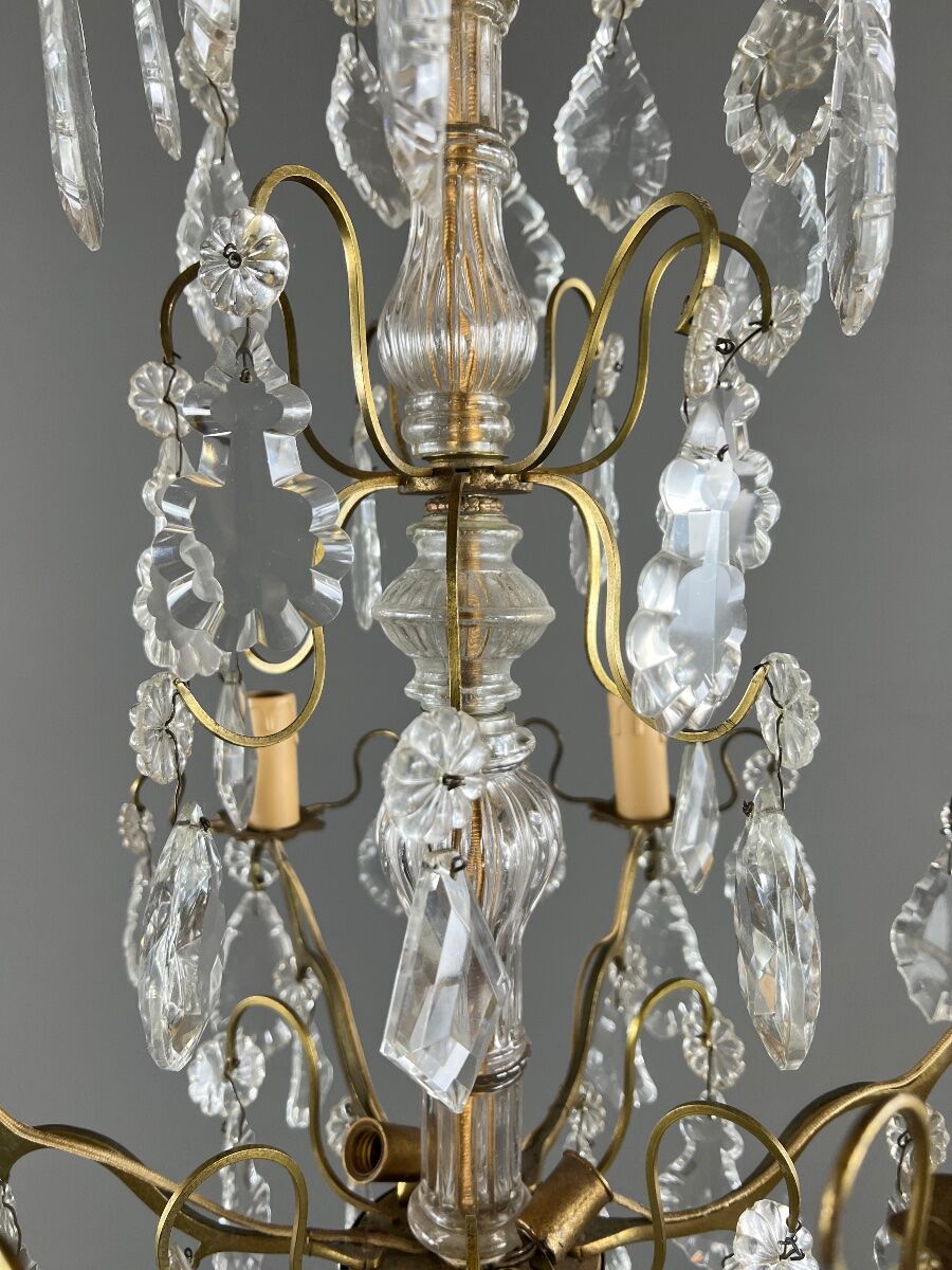 Bronze and crystal chandelier with pendants, Louis XV style, 20th century.