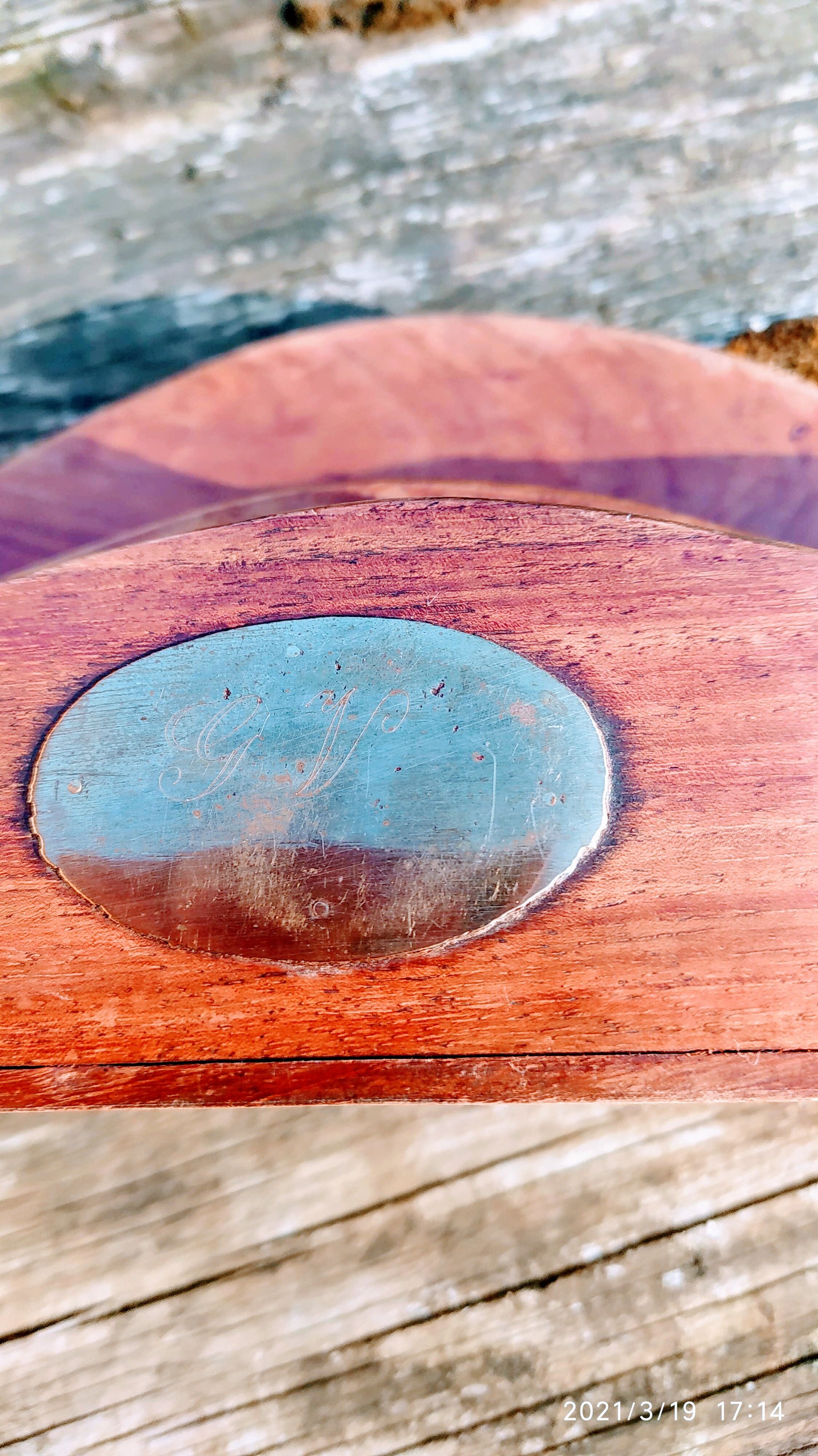 Old exotic wooden and copper mail door