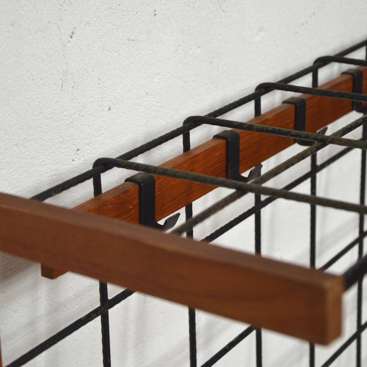 Iron and wood wall coat holders, 1960