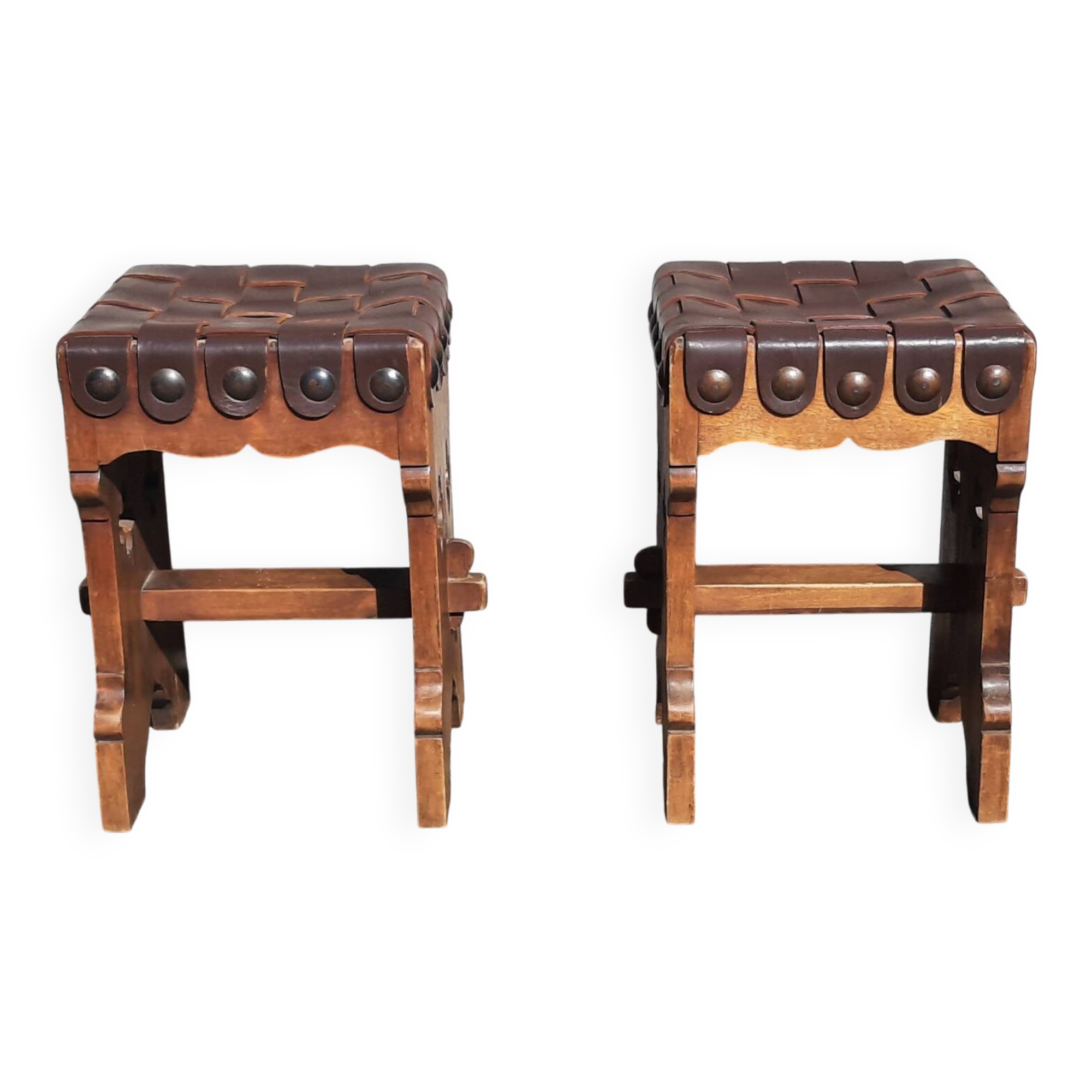 Pair of brutalist stools, leather seat.