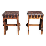 Pair of brutalist stools, leather seat.
