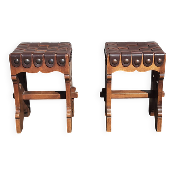 Pair of brutalist stools, leather seat.
