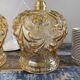 Set of two suspensions in gilded chiseled glass