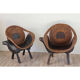 Paire de fauteuils vintage bois sculpté et rotin 1960