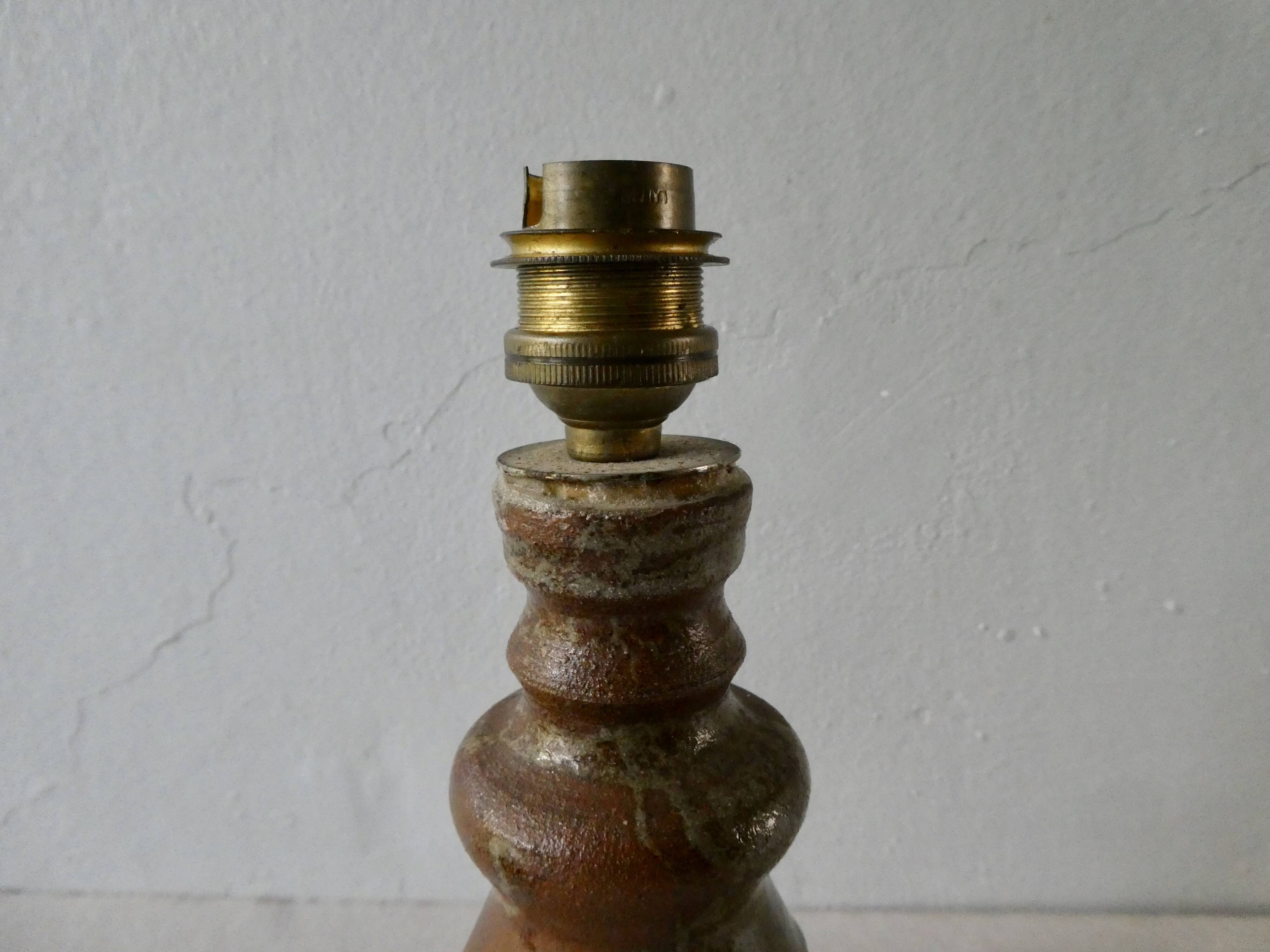 Sandstone lamp, signed, 60s